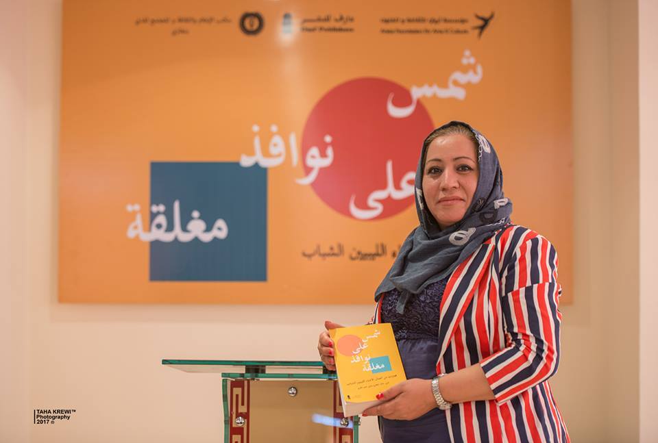 Journalist and writer Laila Moghrabi at the book's launch in Benghazi, one of many launches held across the country. She has had to flee Libya since it was published. 